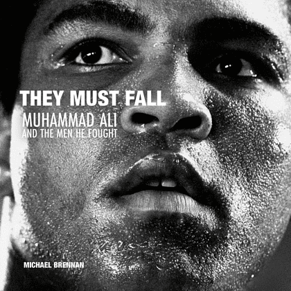 Книга на английском языке "They Must Fall. Muhammad Ali and the Men He Fought", Michael Brennan